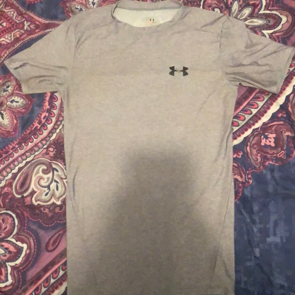 Grey UA compression shirt.